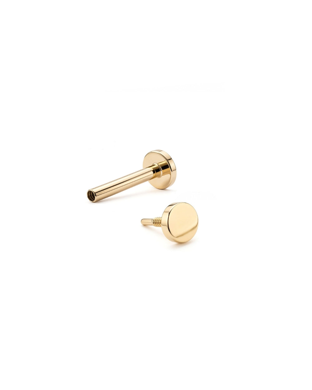 A pair of gold flat circular stud earrings shown from both front and side angles on a clean white background.