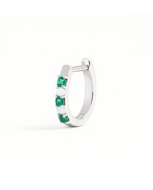 COVETEAR White Gold hoop earring with EMERALD gemstones on a white background