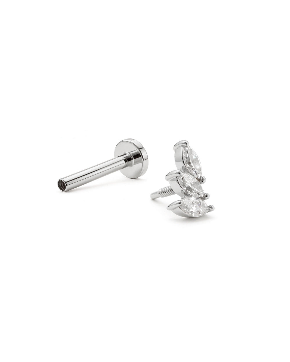 Marquise trilogy diamond earring front in a white gold claw setting lying on the side with a separate flatback labret post on a white background