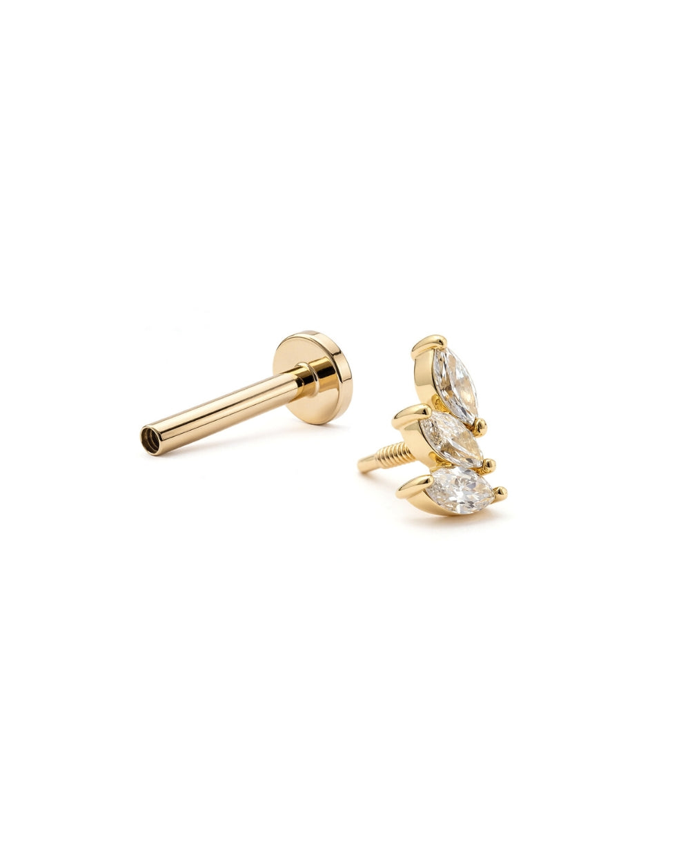 Marquise trilogy diamond earring front in a yellow gold claw setting lying on the side with a separate flatback labret post on a white background