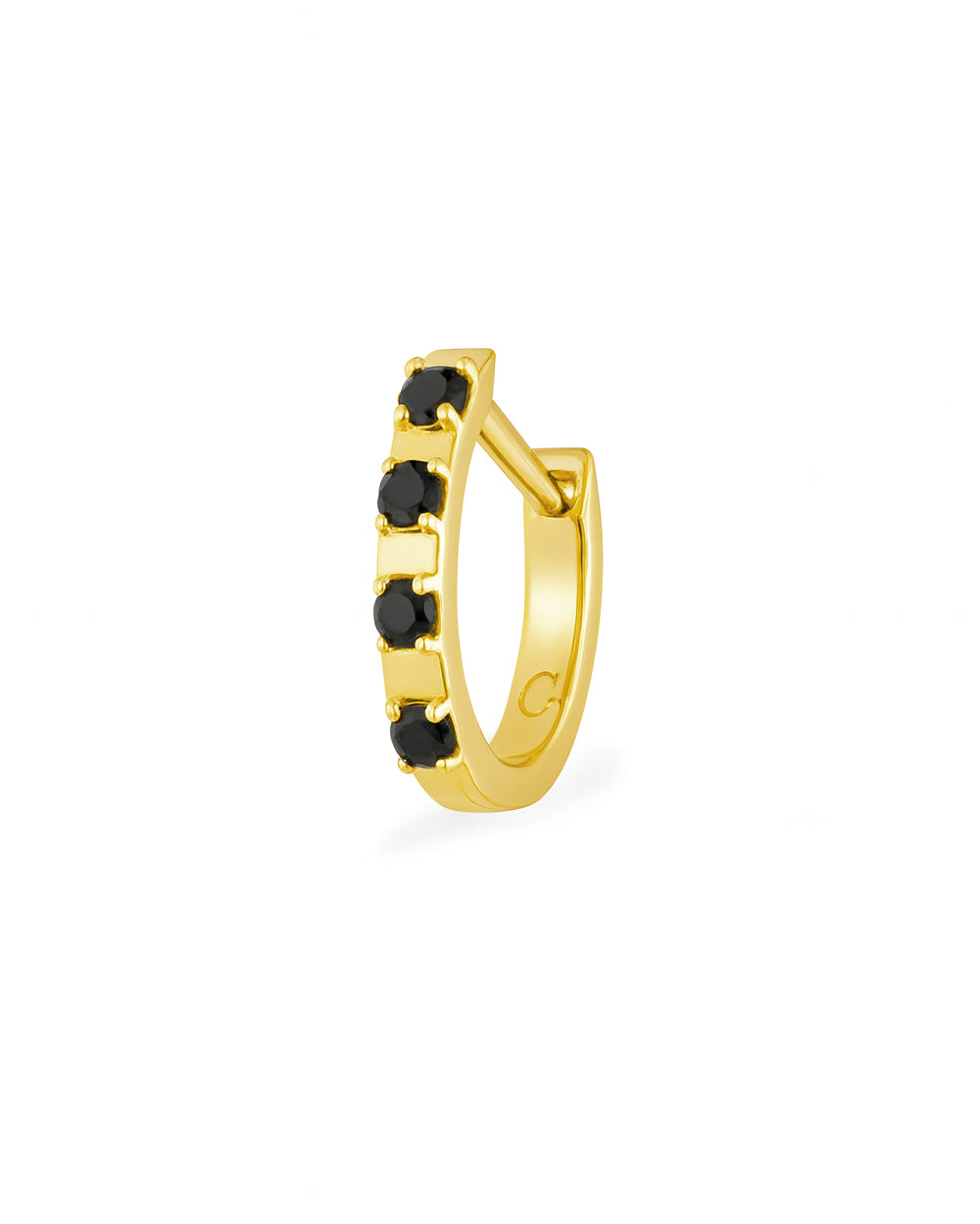 Gold hoop earring with black stones on a white background