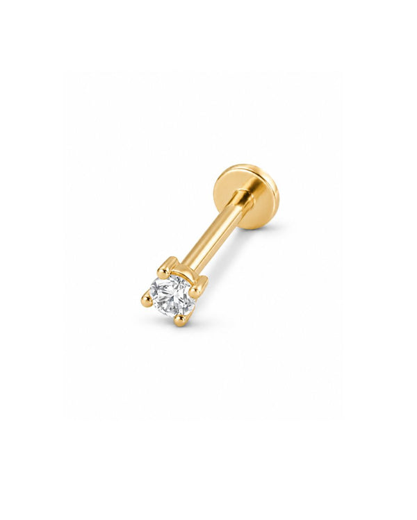 Diamond solitaire earring set in yellow gold claw setting on white background.